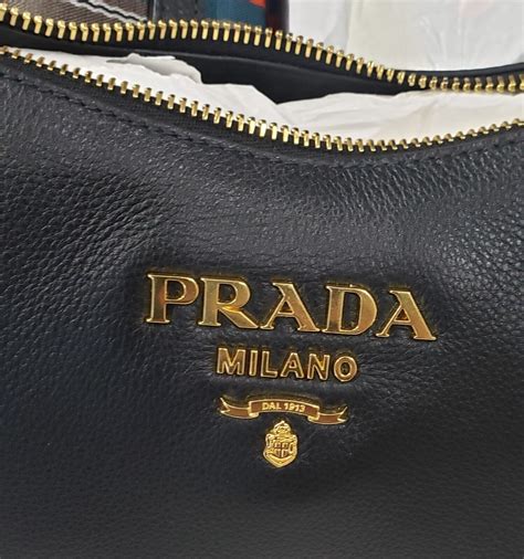 prada camera strap|Prada crossbody with guitar strap.